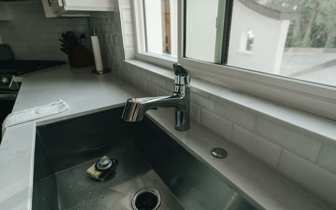 Slow draining sink or shower? What it means & how to clear it